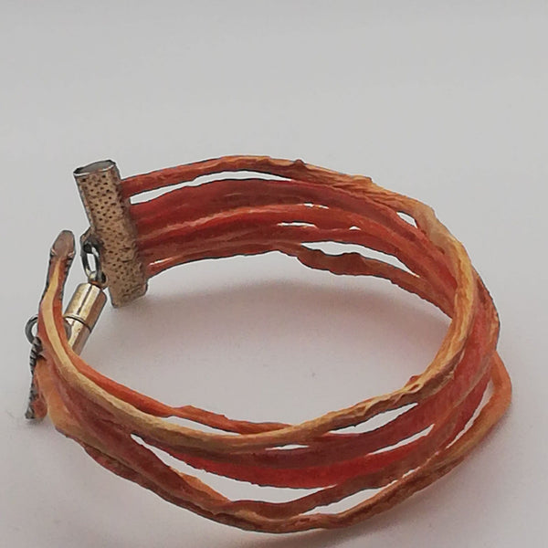 Bracelet SOLANDRA lanières de carotte orange stabilisé aimanté Unisexe
