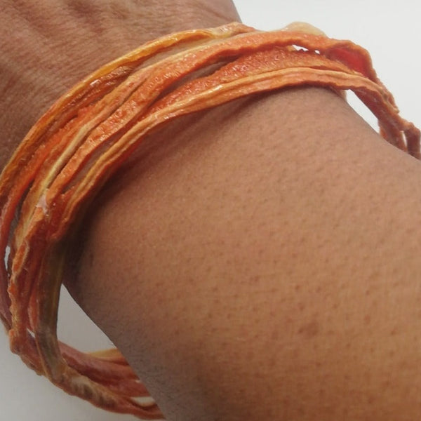 Bracelet SOLANDRA lanières de carotte orange stabilisé aimanté Unisexe