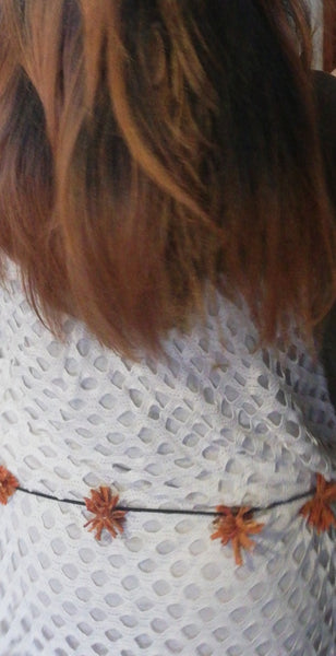 Trois en un en  pompons de carottes orange Stabilisés